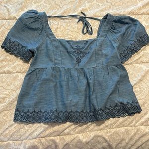 Denim smocked back peplum top